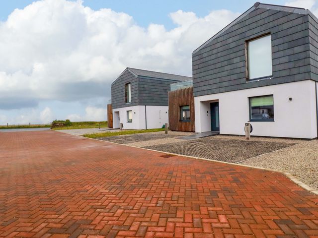 Two modern houses with a driveway at 8 Karn Havos in St. Eval near Mawgan Porth