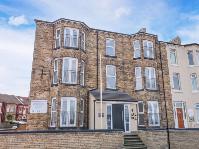 A building with balconies and front entrance at Apartment 1 (2 bed) in Redcar