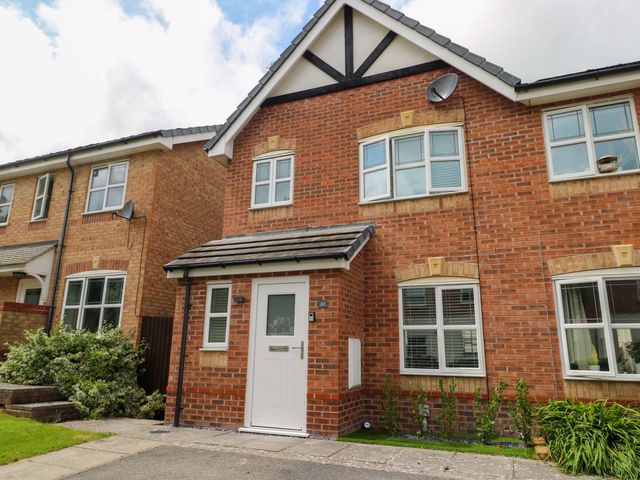 A house exterior with a front door and windows at 20 Cysgod Y Bryn Rhos-On-Sea