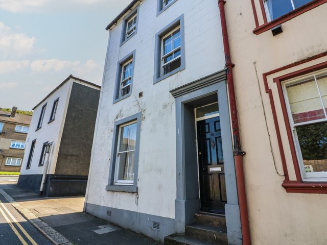 A residential building with entrance and windows at Georgian Town House in Whitehaven