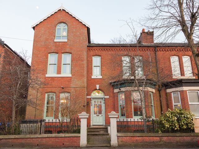 A house with windows and a front door at 4 Kingscliffe Street in Manchester