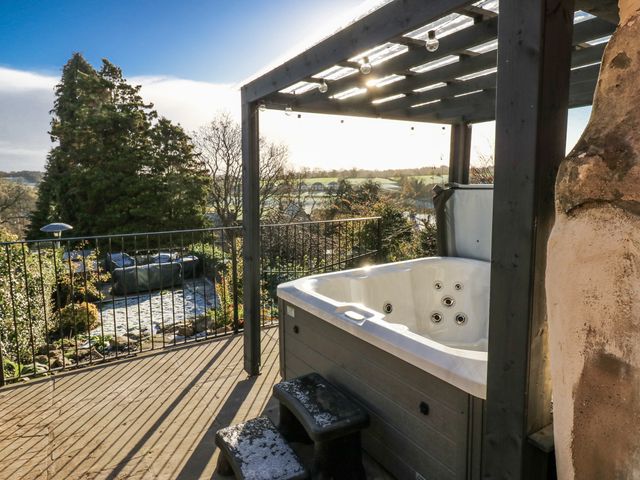 A hot tub on a deck with views in an outdoor space at 26 Frenchgate Richmond
