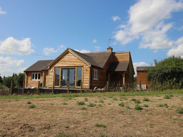 A house exterior with windows and door at Dingle Kidderminster