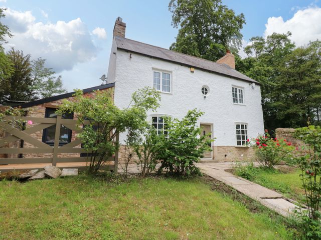 A house with a garden and pathway at White House in Durham
