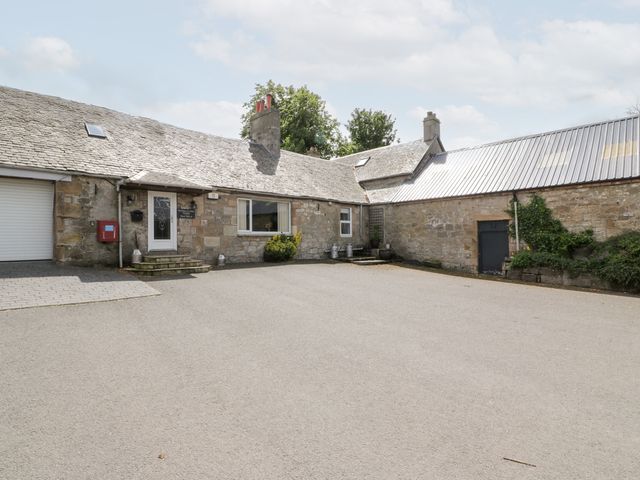 An outdoor view of a house with a driveway at Marshill Farm house Lanark