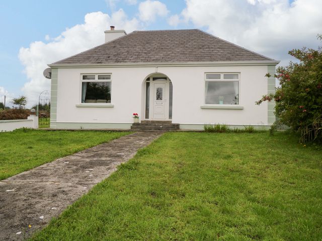 A house with a pathway leading to the front door at CARROWREAGH