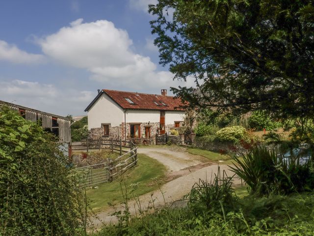 A house with a pathway and garden at Lane End in North Molton