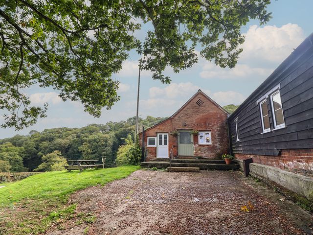 An outdoor area with a building and steps at Upper Pandy Farm in Welshpool