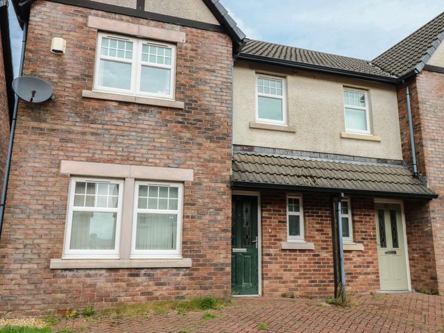 A building with windows and doors in Frizington