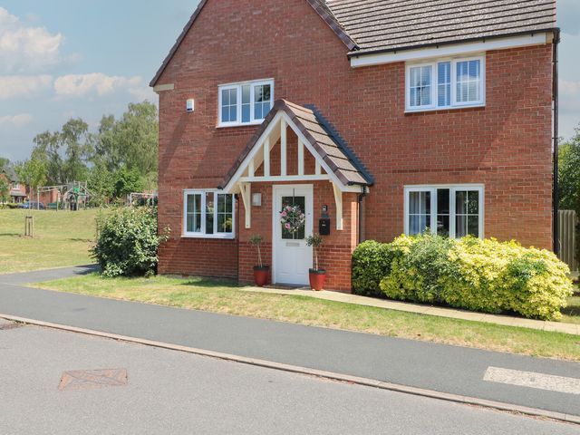 A house with a garden and pathway at 7 Yarnfield Parkway