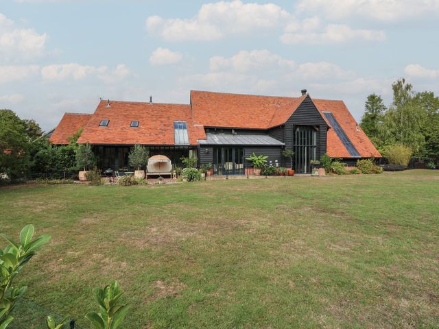 A house with a garden and pathway at Headland Barn in Maldon