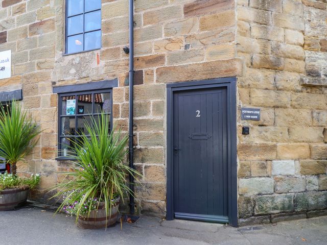A door and window on a stone building at Postman’s Lodge in Great Ayton