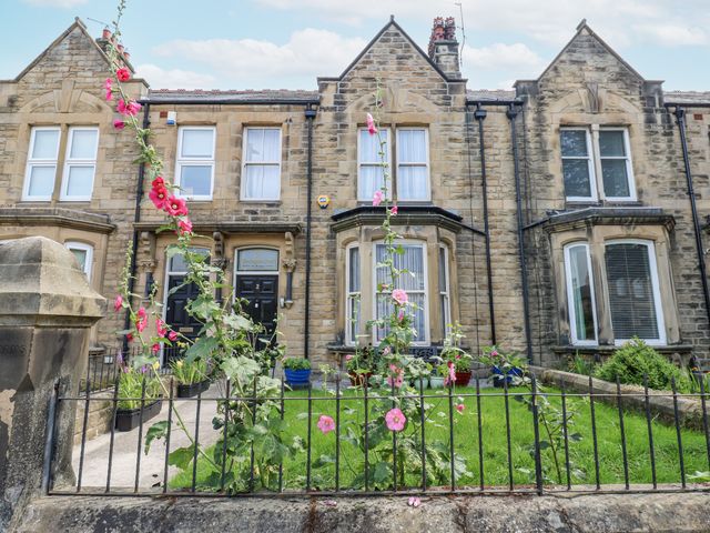 A house with flowers and a garden at St Ronans in Bishop Auckland