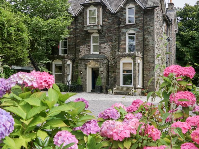A building with flowers in front at Coleridge in Ambleside