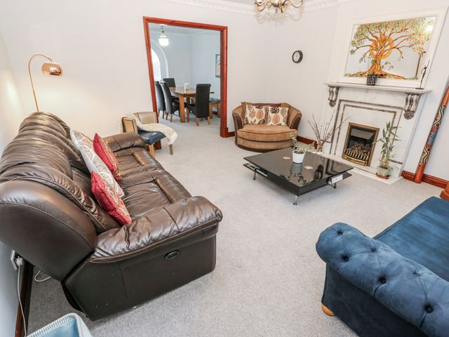 A living room with a sofa and coffee table at The Peak View Holmfirth Hade Edge, Yorkshire