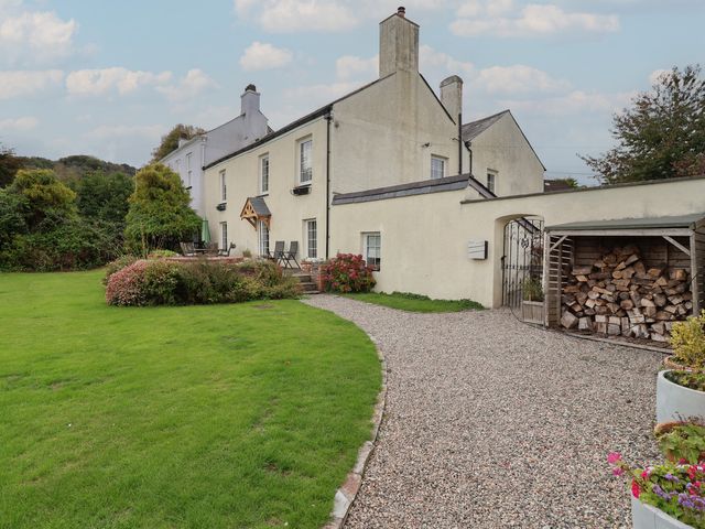 A house with a garden and pathway at The Old Manor House in Lifton