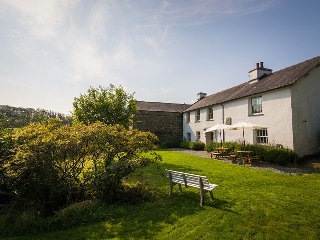 A house with a garden and outdoor seating at Souterstead in Torver near Coniston