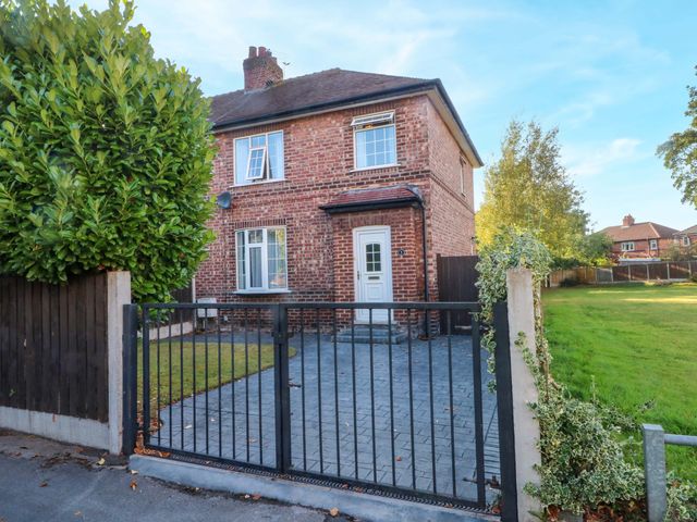 A house with a gate and pathway in front at Ash House in 