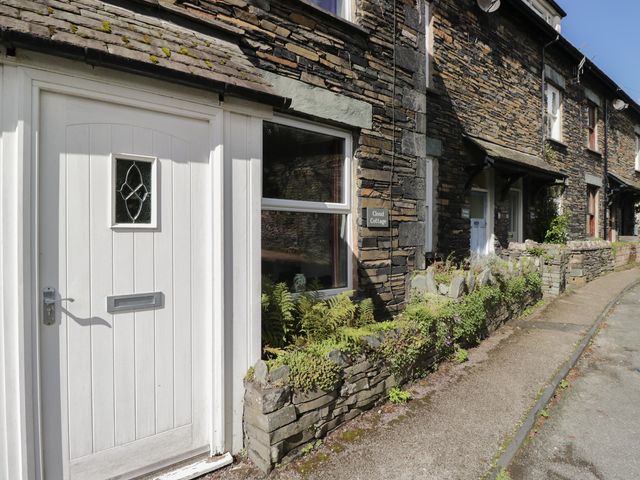 A door and window of Cloud Cottage in Ambleside