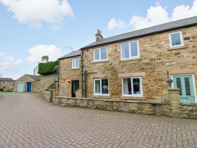 An outdoor view of a house with a driveway at 1 Kyles Yard Barnard Castle