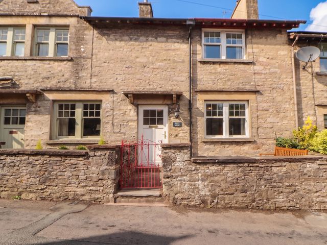 A house with a red gate at East View in Ravenstonedale near Kirkby Stephen