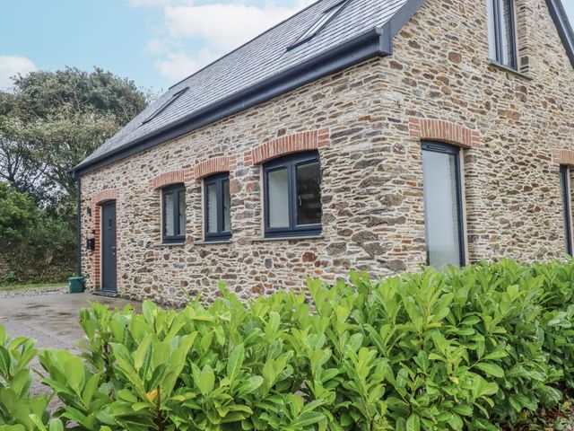 A house with windows and a door at Barn 2
