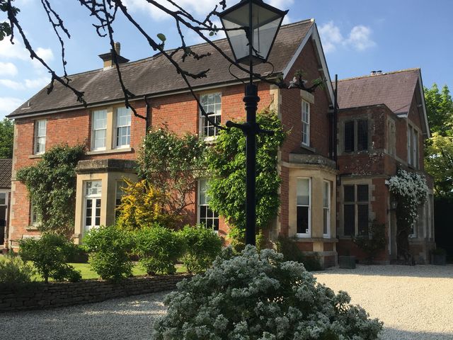 A house with garden and lamp post at The Mount Private Estate in Upper Seagry