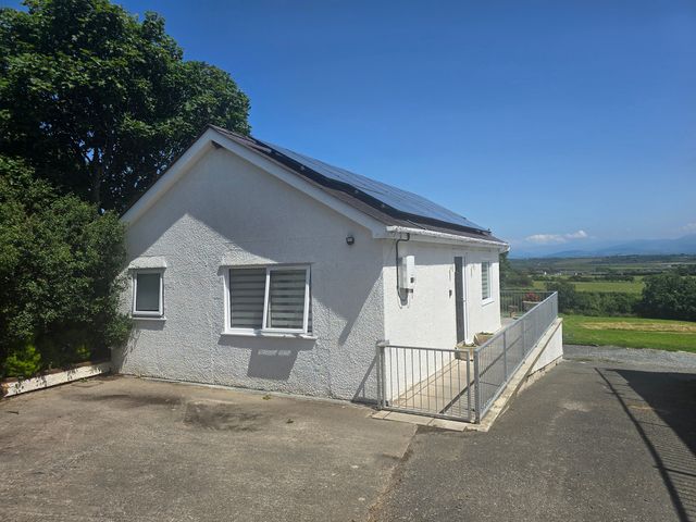 A house with solar panels in Bethel