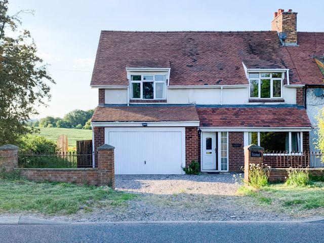 A house with a garage and front door at Scamnel in Eccleshall