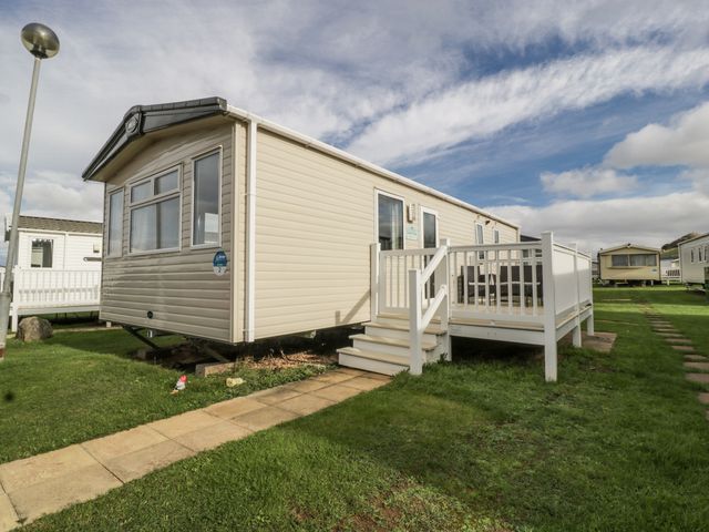 A holiday home with deck and steps at Caravan - 2 Bayside Watchet