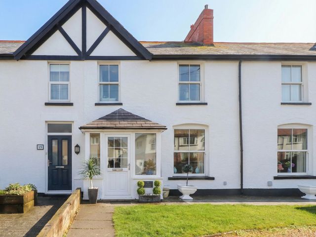 A house with a front door and windows at The Hideaway in Penrhyn Bay
