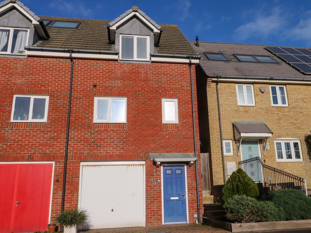 A residential building with garage and front door at Harbour Way, Shoreham-By-Sea