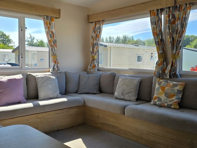 A living room with seating area at Caravan