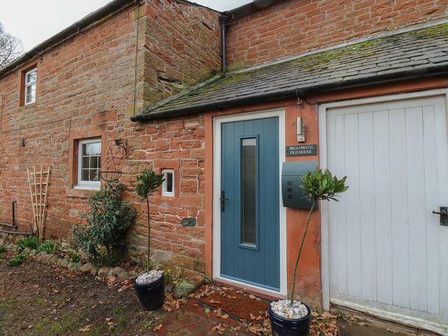 An entrance with a blue front door and mailbox at Broadwath Old House Heads Nook