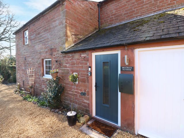 Front entrance with a blue door and mailbox at Broadwath Old House Broadwath near Corby Hill