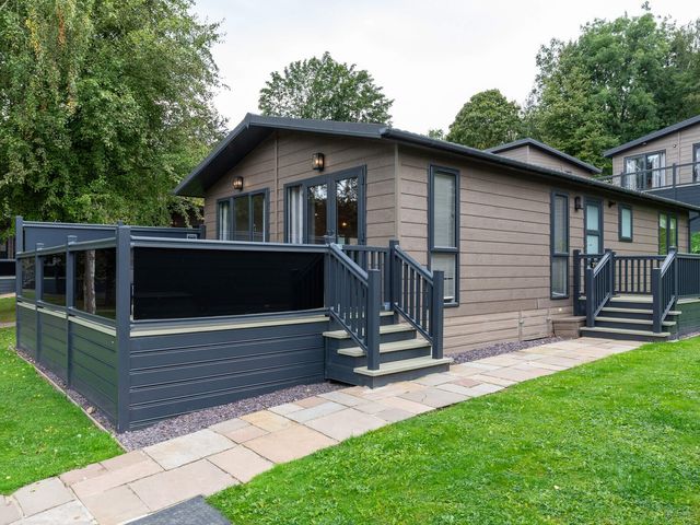 A building with a deck and steps at Wensleydale (Pet) Aysgarth