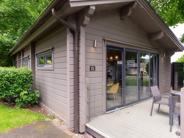 An exterior view of a house with a deck at Middleham (Pet) Leyburn