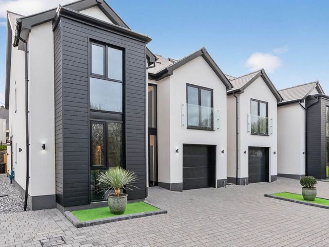 A house with windows and garage at Ty Uchel