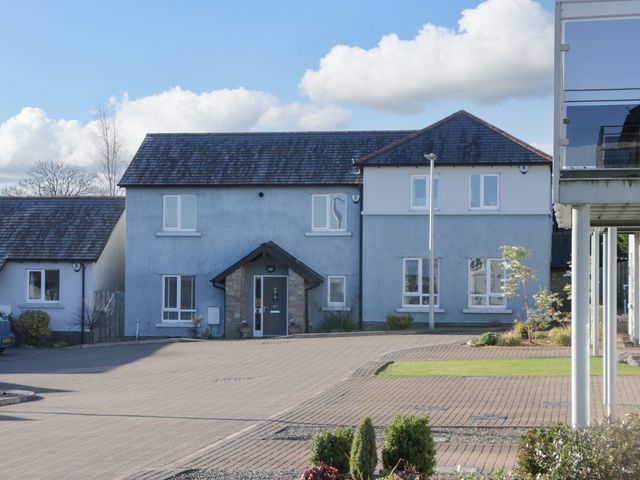 A house with windows and a door at 27 Oversands View 