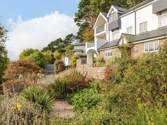 A house with a garden and pathway at 4 St Elmo Court Salcombe