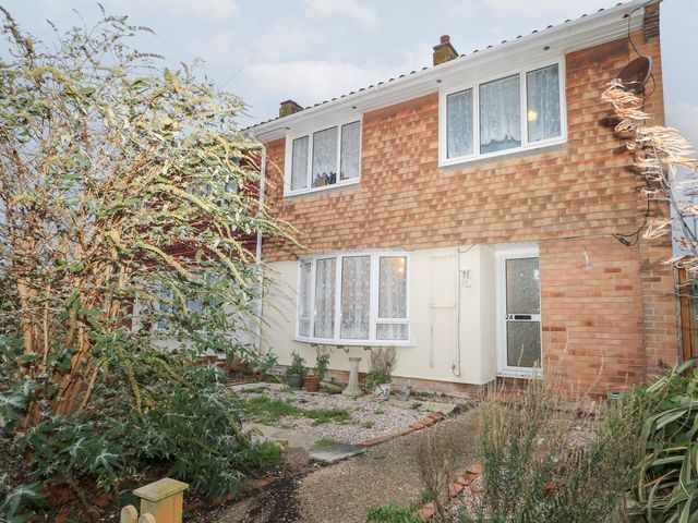 A house exterior with garden and pathway at 24 Dunkirk Close Romney Marsh