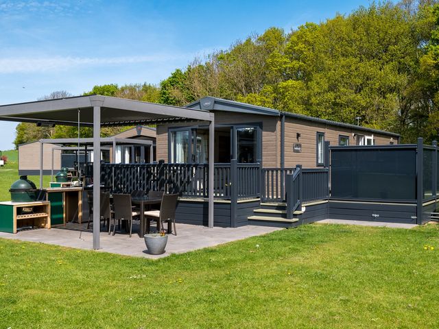 An outdoor area with a patio and dining set at Leven (Pet) Great Ayton