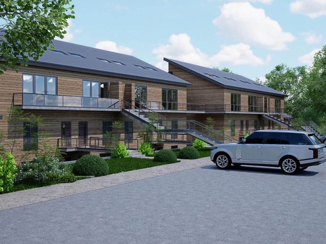 Exterior view of a multi-story building with balconies at Arvo Suite 1.0 in Marhamchurch