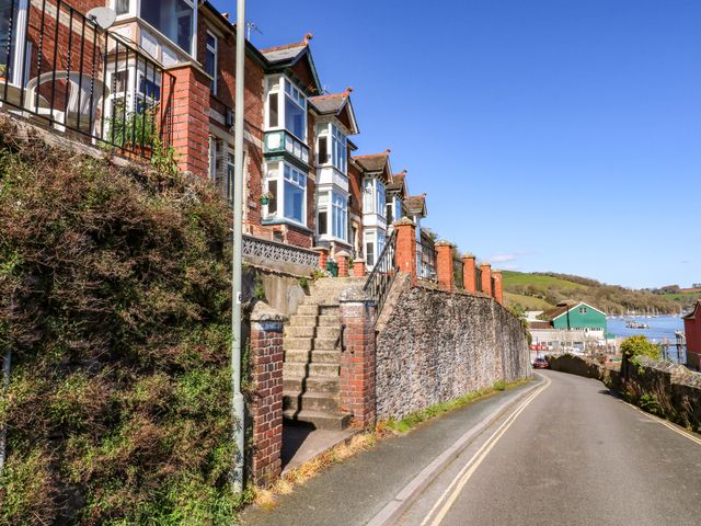 A street view with houses and steps at 43 Sandquay Road Dartmouth
