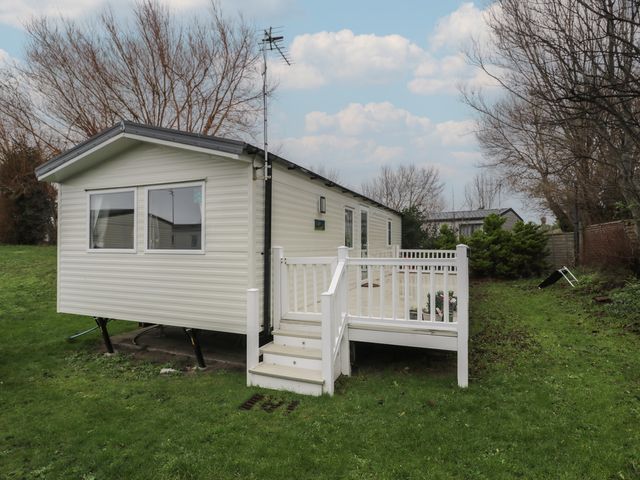 A mobile home with a staircase and railing at Willerby Ellerrton (delyn)