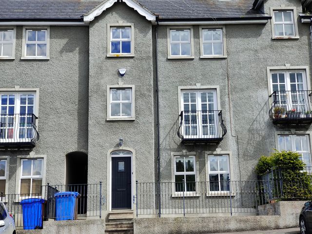 A building with balconies and fences at 17 Castleview in Ballymena