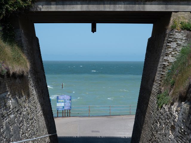 A view of the sea from underneath a structure at Kinamara Ensuite Room