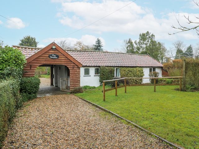 A house with a pathway and garden at The Pantiles in Banham