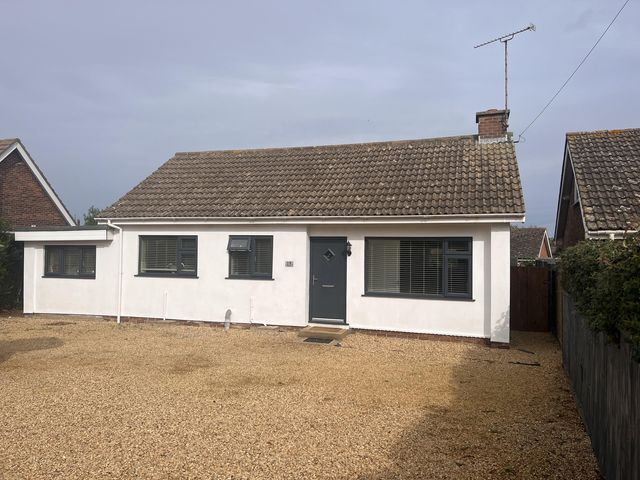 A house with a gravel driveway at 15 Lamsey Lane in King's Lynn