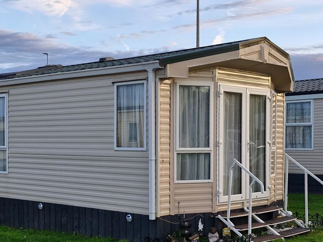 A caravan exterior with steps at Red Lion Caravan Park